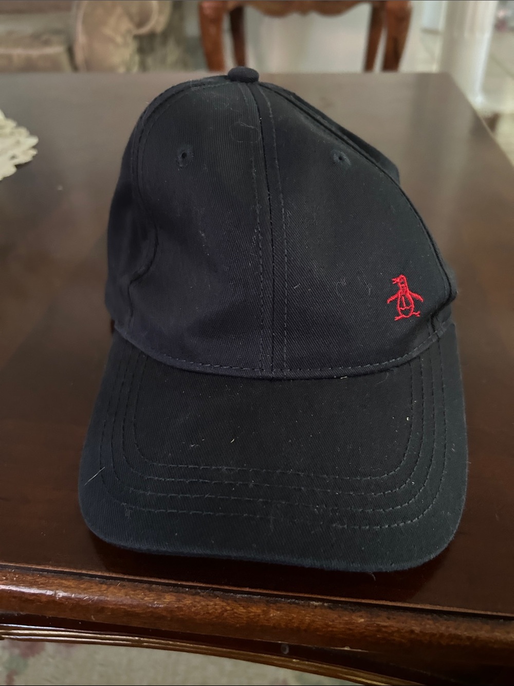 Black Baseball Cap with Red Embroidered Penguin Logo